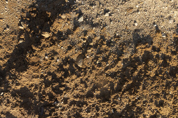a close-up of a pile of sand on a construction site