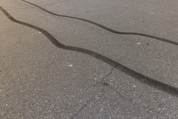 tire tracks during dangerous driving on the road