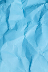 Obraz premium a piece of crumpled blue paper