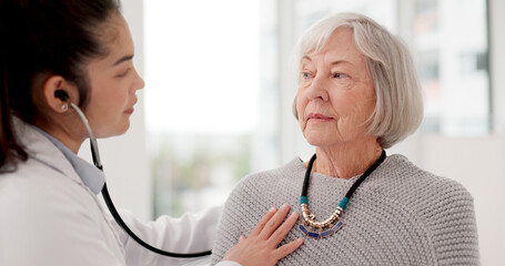 Fototapeta premium Woman, doctor and listening for patient heart beat in checkup, appointment or consultation at hospital. Medical healthcare expert examining elderly customer in cardiology with stethoscope at clinic