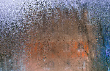 wet glass background. drops on the glass