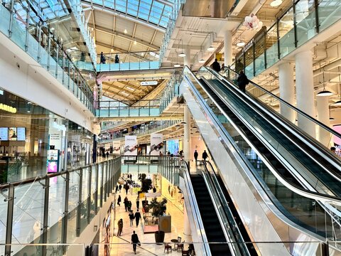 Moscow, Russia, May 15, 2024. Aviapark shopping center, INTERIOR OF A MODERN SHOPPING CENTER WITH ESCALATORS. MULTISTAGE SHOPPING AREAS.