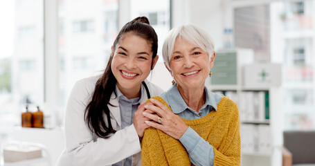 Happy, hug and face of a doctor with a woman for medical trust, healthcare and help. Laughing, care...