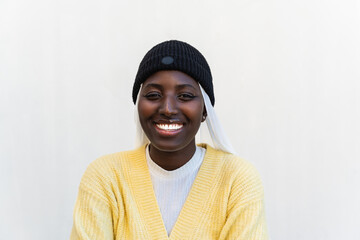 Face portrait of modern smiling black Muslim girl