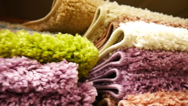 Close-up of many soft colorful carpets