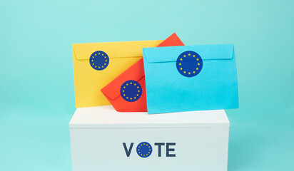 EU election, ballot box, european union flag, blue and yellow stars, citizens of Europe voting Parliament