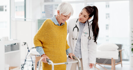 Elderly woman, doctor and physiotherapy with walker for support, help and healthcare. Walking...