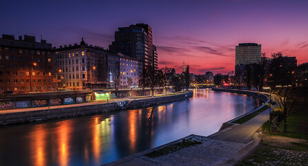 Donaukanal Vienna Austria Sunset Cityscape with Reflections on River, Evening Skyline