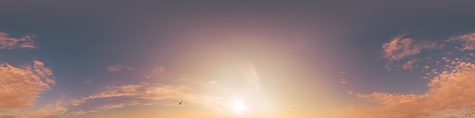 Dramatic Sunset sky 360 panorama. Vibrant sky with bright glowing red pink Cumulus clouds. HDR 360...