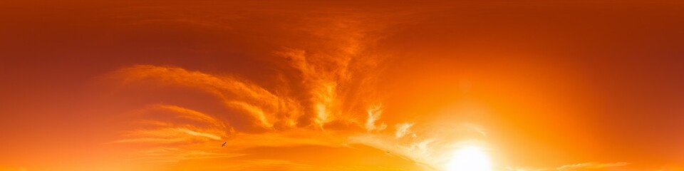Golden glowing red orange overcast sunset sky 360 hdr panorama. Seamless spherical equirectangular...