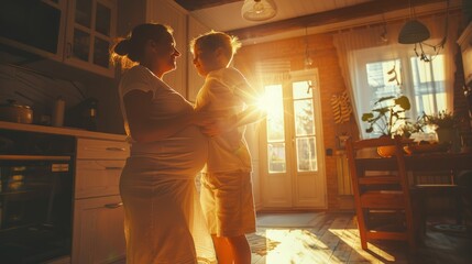 Happy family, pregnant woman with boy child and in kitchen at their home with lens flare. Mother with love or care, mother and cheerful parent with son bonding with dance in their house together