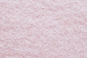 Light pink woolen jersey fabric texture as background