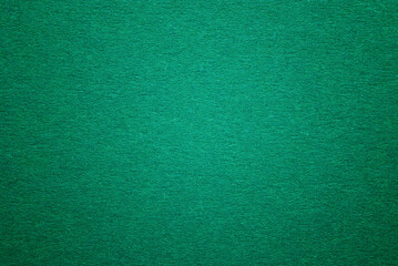 A sheet of green cardboard texture as background