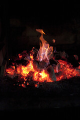 Close-Up of Glowing Charcoal Fire Embers Highlighting Intense Heat and Rich Red-Orange Hues