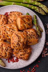 Triangular puffs with feta cheese, tomatoes with salt, spices and herbs