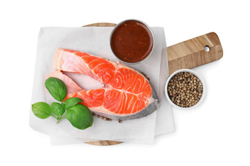 Fresh fish, basil, peppercorns and marinade isolated on white, top view