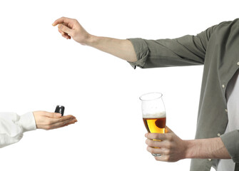 Man with glass of alcoholic drink giving car key to woman on white background, closeup. Don't drink...