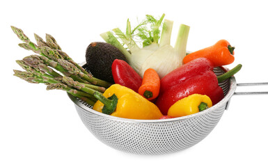 Metal colander with different vegetables and avocado isolated on white