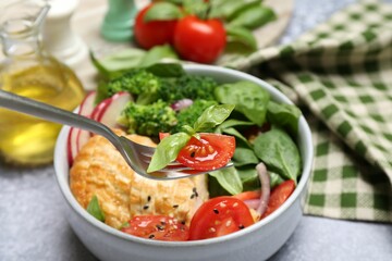Healthy meal. Eating tasty vegetables and chicken at table, closeup