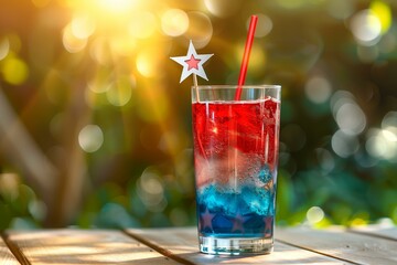 vibrant layered cocktail in red, white, and blue, served in a clear glass. The drink is accessorized with a star-patterned straw