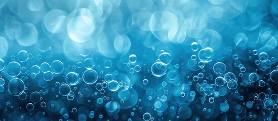 Shimmering water bubbles on blue background