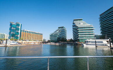 Al Raha waterfront with boats and buildings