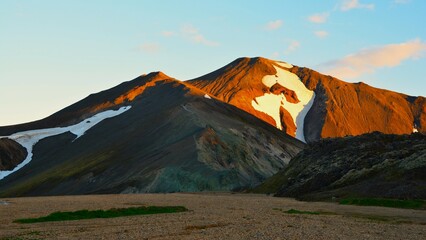 Picturesque sunrise landscape of Bláhnjúkur volcano (940 m) as a part of Landmannalaugar, a...
