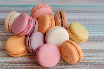 Macaron, typical French sweet, homemade macaron in different flavors and colors.