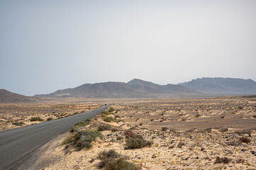 Arid, volcanic landscape of the southern side of Jandia Nature Reserve, Jandia Peninsula, Fuerteventura, Spain