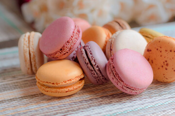 Macaron, typical French sweet, homemade macaron in different flavors and colors.