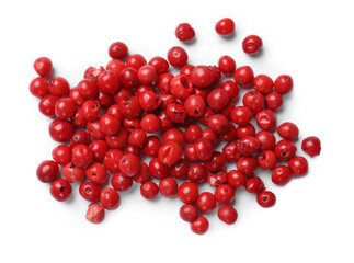 Aromatic spice. Many red peppercorns isolated on white, top view