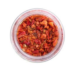 Aromatic spice. Red chili pepper flakes in jar isolated on white, top view