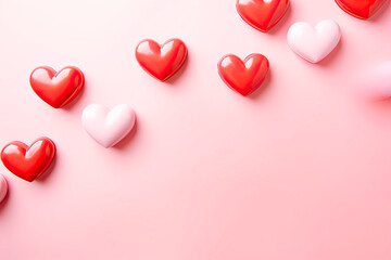 Red and pink hearts on a pink background