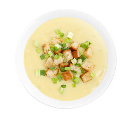 Tasty potato soup with croutons and green onion in bowl isolated on white, top view