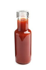 Tasty ketchup in glass bottle isolated on white. Tomato sauce