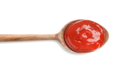 Tasty ketchup with wooden spoon isolated on white, top view. Tomato sauce