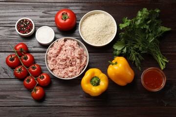 Making stuffed peppers. Ground meat and other ingredients on wooden table, flat lay