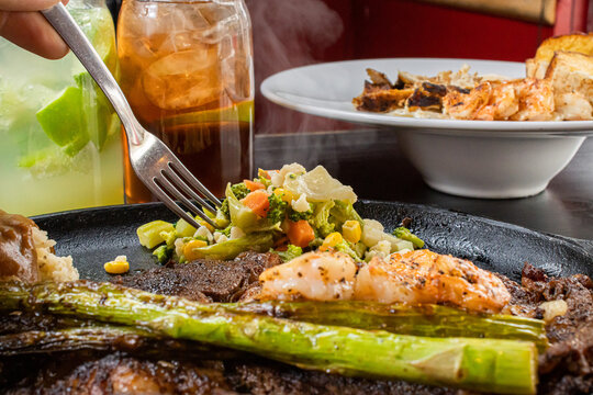 Hot Plate of shrip and vegetables