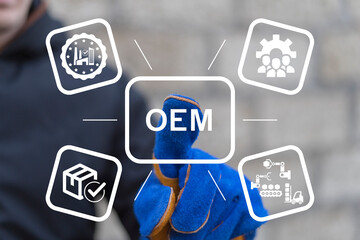 Engineer using virtual interface presses text: OEM. OEM Original Equipment Manufacturer concept. Business model development that makes subsystems or parts used by other companies to make end product.