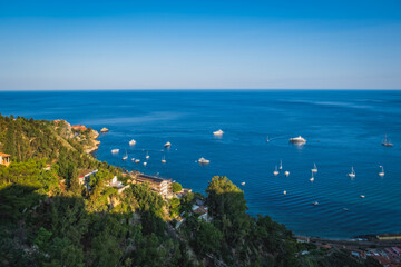 Beautiful panoramic landscape of Taormina, Italy. Sicilian seascape. Travel photography. June 2023