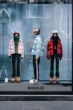 Milan, Italy - 04.12.2021: window display of Moncler store in Milan, vitrine of the shop.