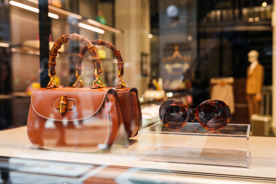 Milan, Italy - 24.04.2024: Gucci Cleo bag showcase at shopping gallery in the center of Milan, Galleria Vittorio Emanuele, vitrine of the clothes shop