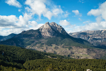 Pedraforca is an emblematic mountain of Catalonia located in the Cadi mountain range. A mountain that has two peaks separated by a large col.  Landscape and background photography in spring.