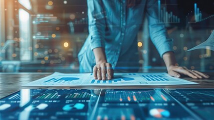 business analyst reviewing documents with transparent financial graphs overlaid, merging traditional paperwork with modern data analytics.