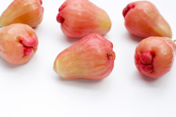 Fresh rose apple fruits on white background.