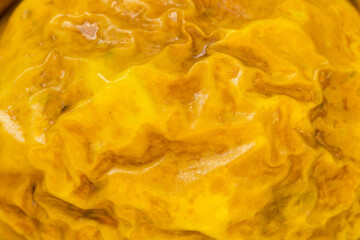 Macro texture photo of passion fruit peel.