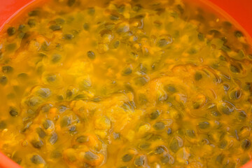 Macro photography of passion fruit pulp.