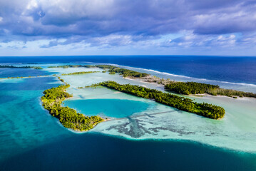 Aerial shot of Palmyra Atoll with islands, reef, lagoon, causeways and surrounding ocean