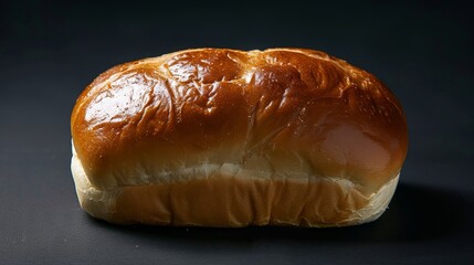 Intimate view of a soft and fluffy brioche bun, highlighting its rich, buttery, and elegant golden exterior, perfect for ads, isolated background
