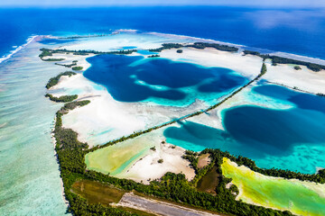 Aerial shot of Palmyra Atoll with islands, reef, lagoon, causeways and surrounding ocean	
